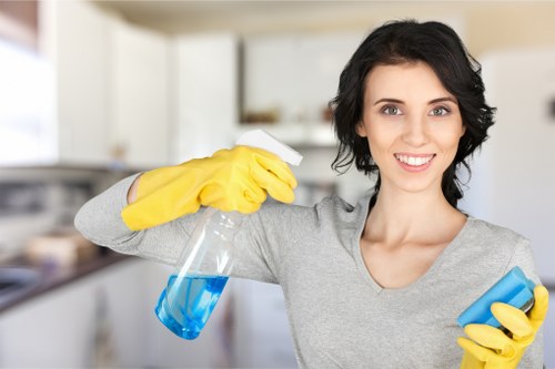 Technician checking cleaning equipment before use